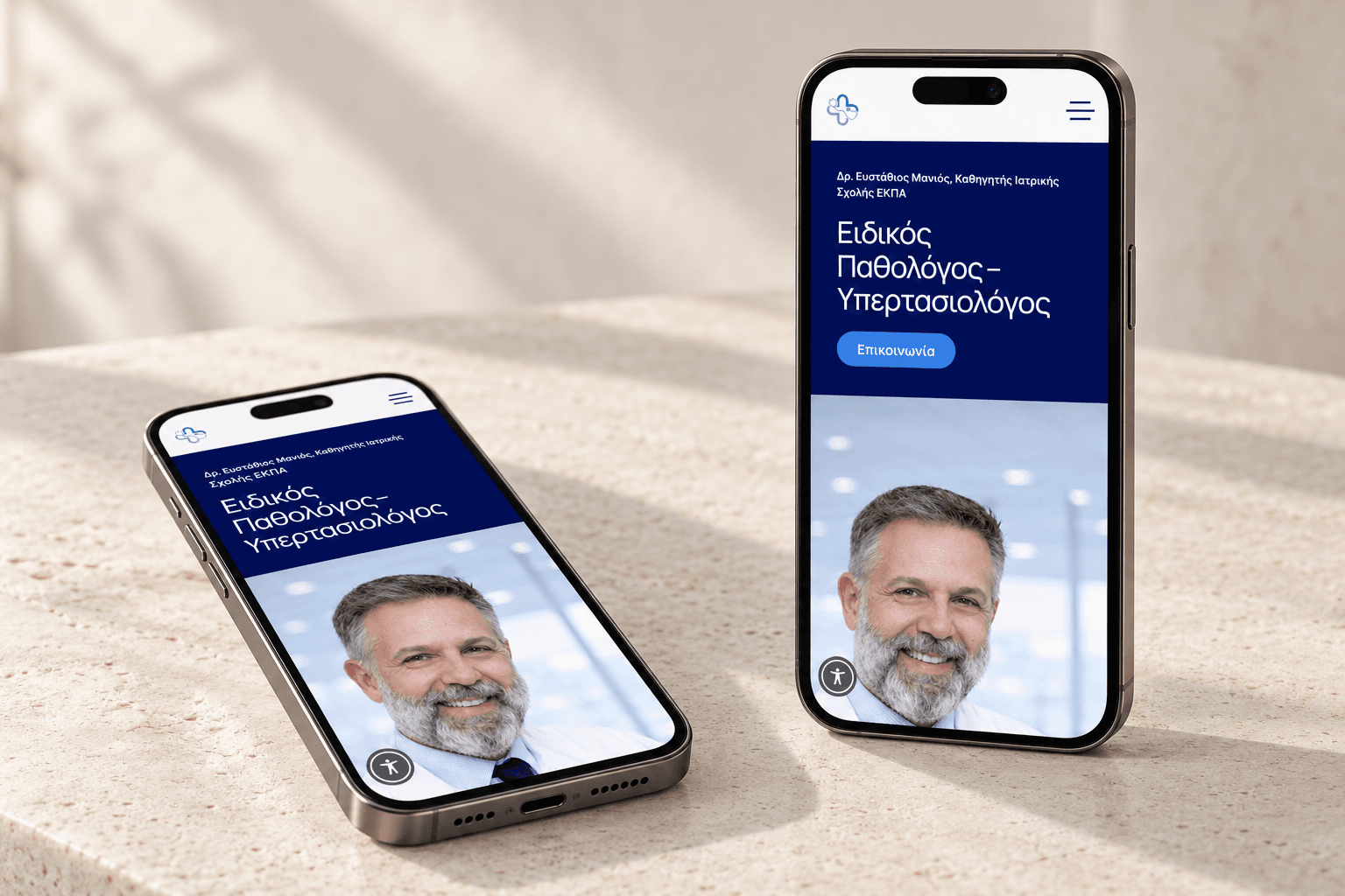 The responsive Efstathios Manios homepage shown on two smartphones